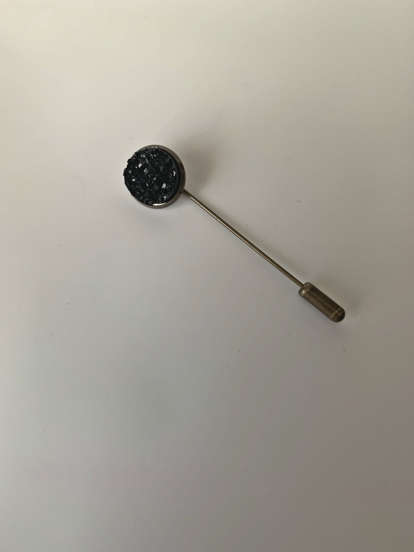 Lapel pin black light