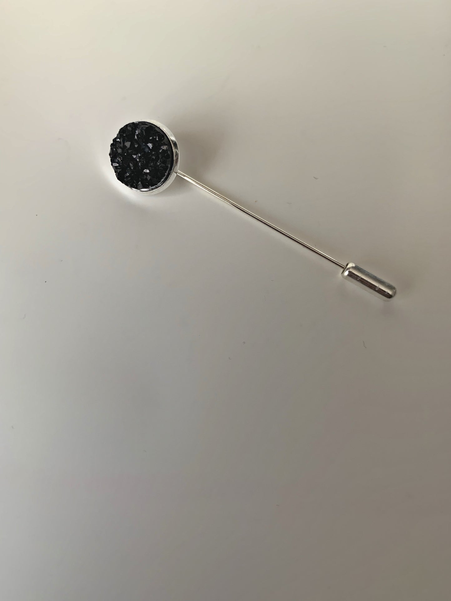 Lapel pin black light