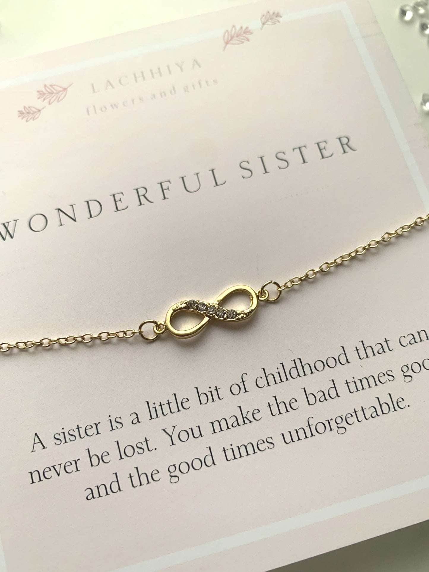 Sister with eternity charm