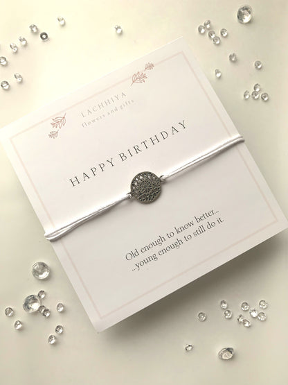 Happy birthday with floral charm